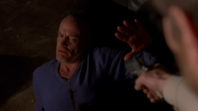Michael Bowen as Jack Welker, held at gun point by Walter White in Breaking Bad.