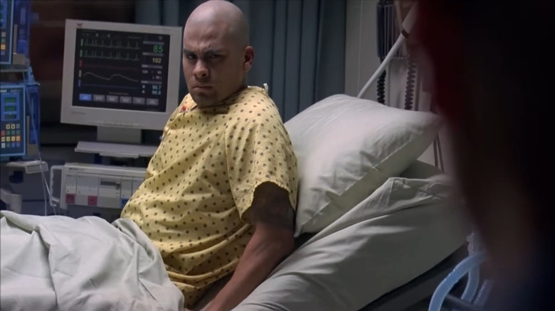 Daniel Moncada as Leonel Salamanca, sitting up in bed in Breaking Bad.