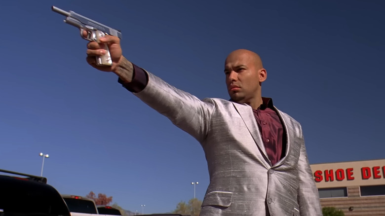 Luis Moncada as Marco Salamanca, aiming a gun in Breaking Bad.
