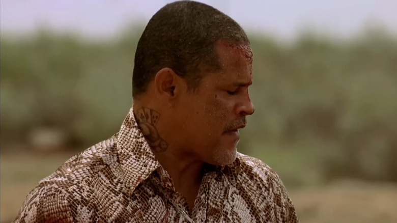 Raymond Cruz as Tuco Salamanca, looking down in Breaking Bad.