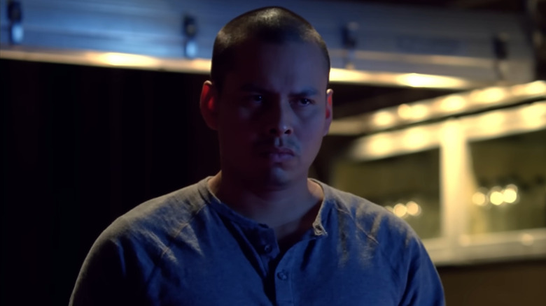 Jeremiah Bitsui as Victor, scowling in Breaking Bad.