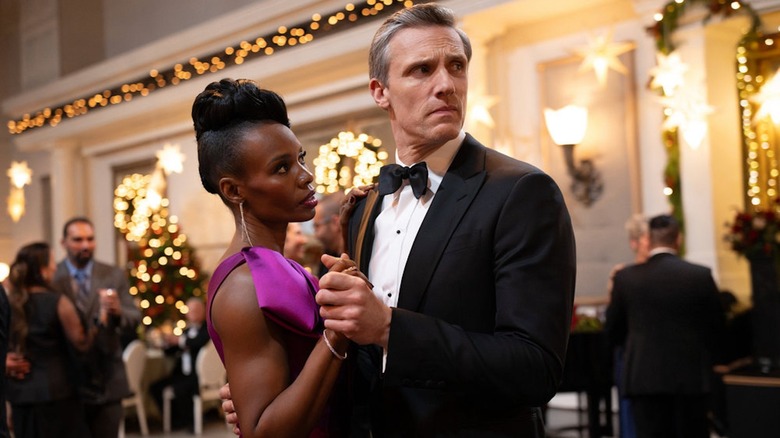 Tamberla Perry as Carol and Teddy Sears as Josh dance at a gala in Brilliant Minds