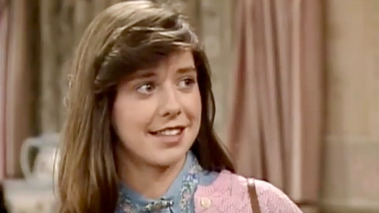 Alyson Hannigan speaking to someone at home