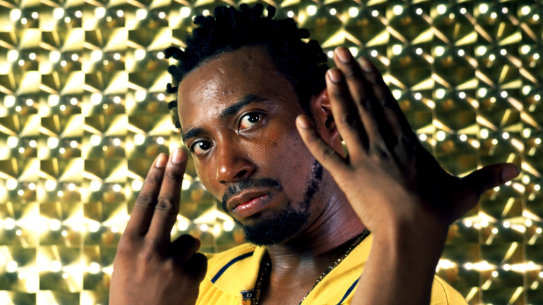 Ol' Dirty Bastard holding up hands in portrait