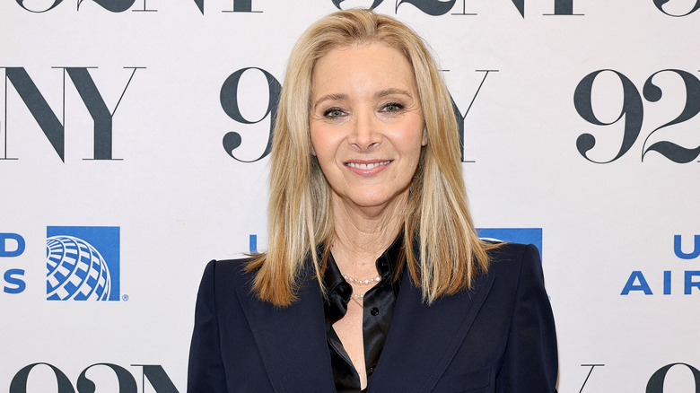 Lisa Kudrow smiling and wearing black