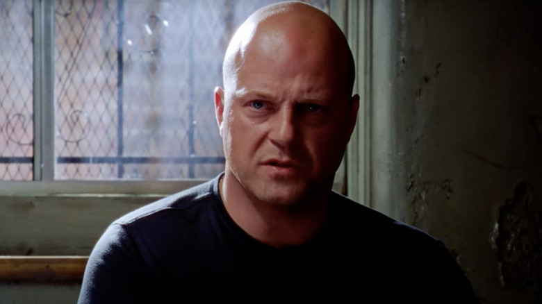 Vic Mackey (Michael Chiklis) speaks by a barred window in The Shield