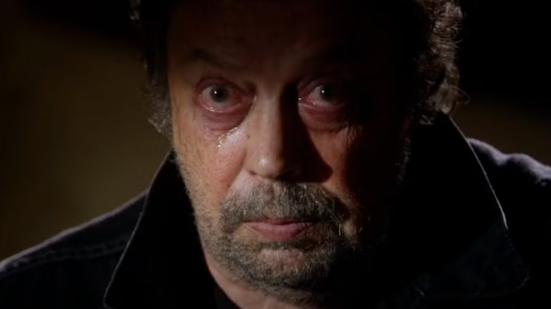 Tim Curry as Billy Flynn, eyes red and watery on Criminal Minds.