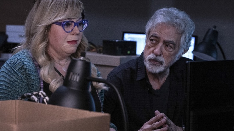 David Rossi looking at Penelope Garcia who is looking at her computer