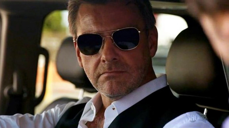 Ray Stevenson as Isaak Sirko, driving a car in Dexter.