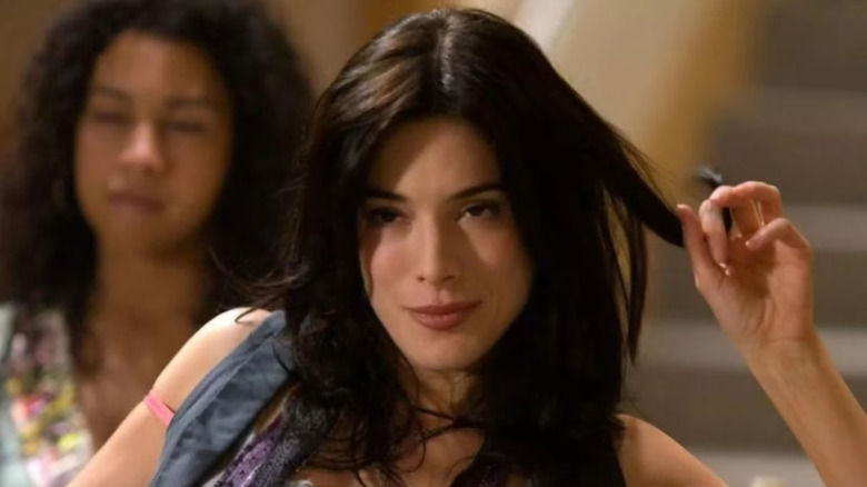 Jaime Murray as Lila West, twirling her hair in Dexter.
