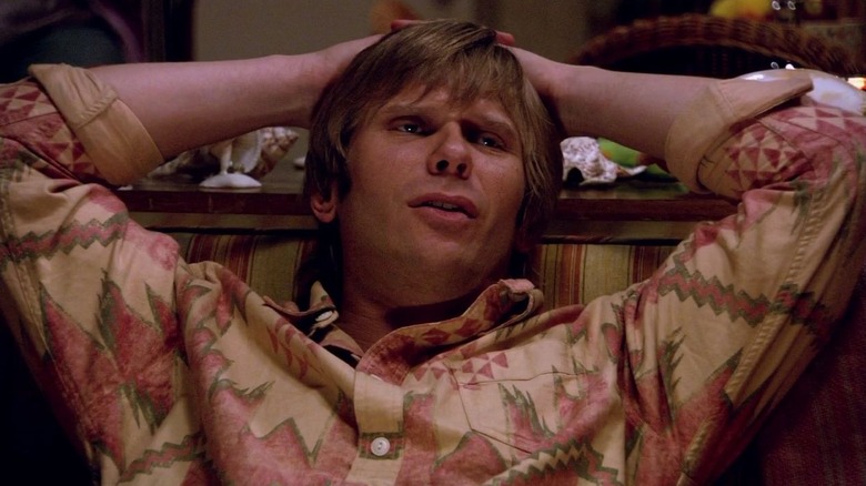 Mark Pellegrino as Paul Bennett, sitting in a chair in Dexter.
