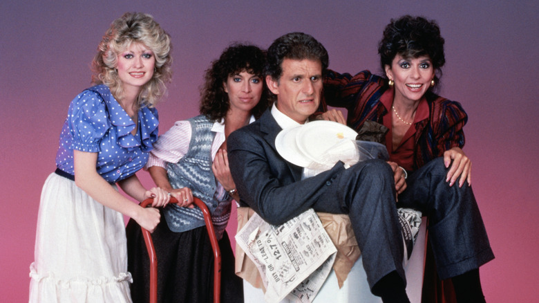 the cast of the sitcom "9 to 5" (1982) pose for a promo portrait