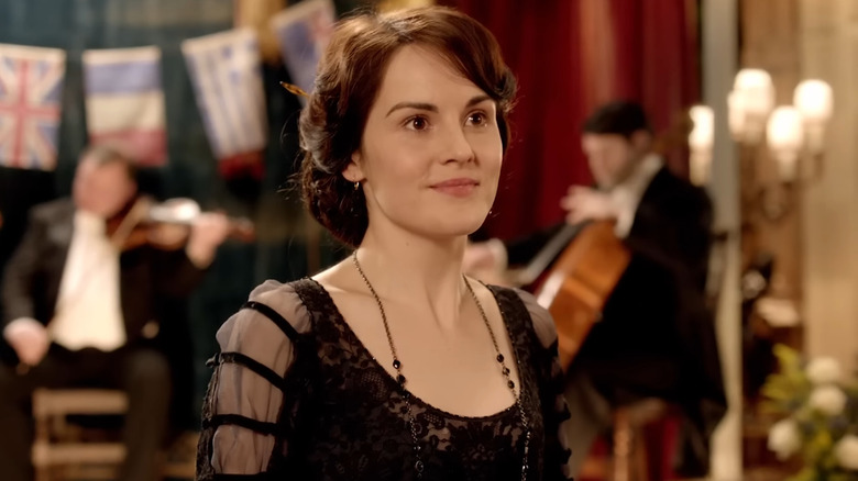 Mary Crawley (Michelle Dockery) wearing a black dress in Downton Abbey