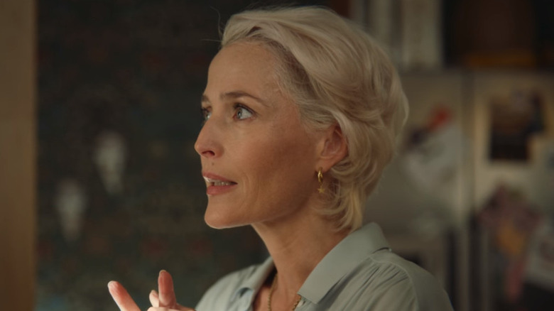 Jean Milburn (Gillian Anderson) clasping her hands on Sex Education