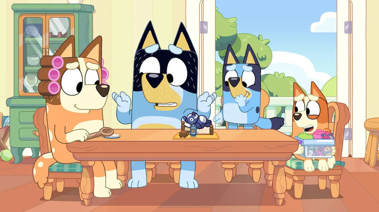 The Heeler family sitting at the table on Bluey