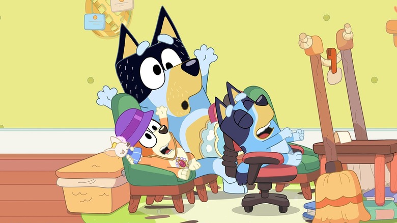 Bandit playing with Bluey and Bingo on Bluey