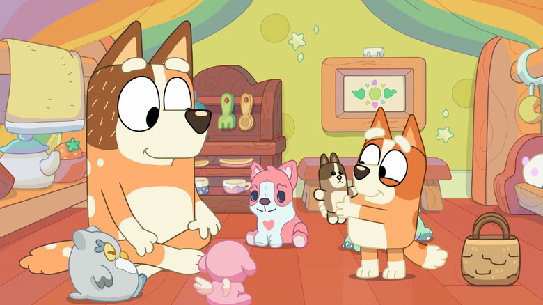 Chilli playing dolls with Bingo on Bluey