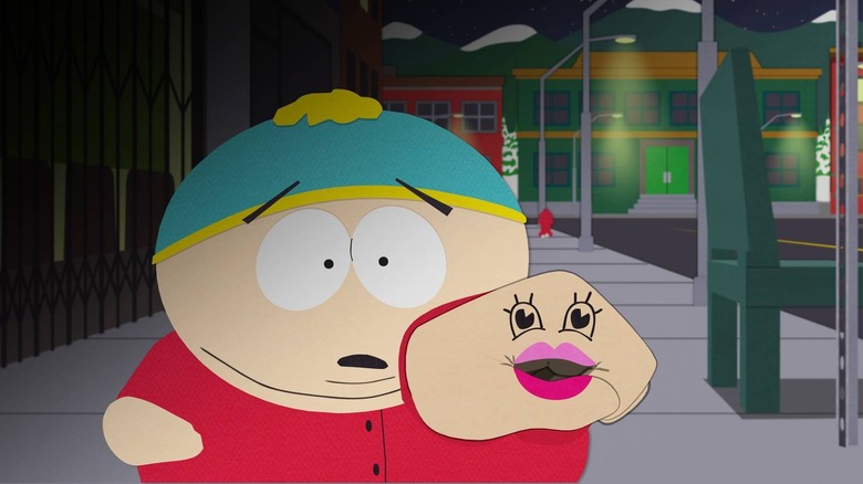 Cartman holds up hand covered in marker and makeup on South Park