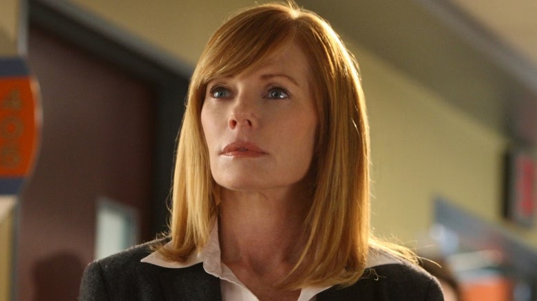 Catherine Willows wearing a suit in "CSI: Crime Scene Investigation"