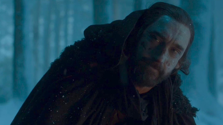 Joseph Mawle as Benjen Stark scarred in a black cloak in Game of Thrones