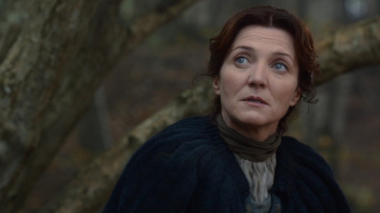 Michelle Fairley as Catelyn Stark looking up in Game of Thrones