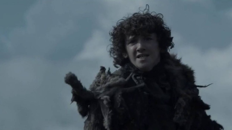 Art Parkinson as Rickon Stark running in Game of Thrones
