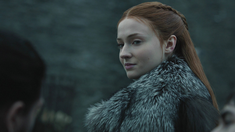 Sophie Turner as Sansa smiling in Game of Thrones