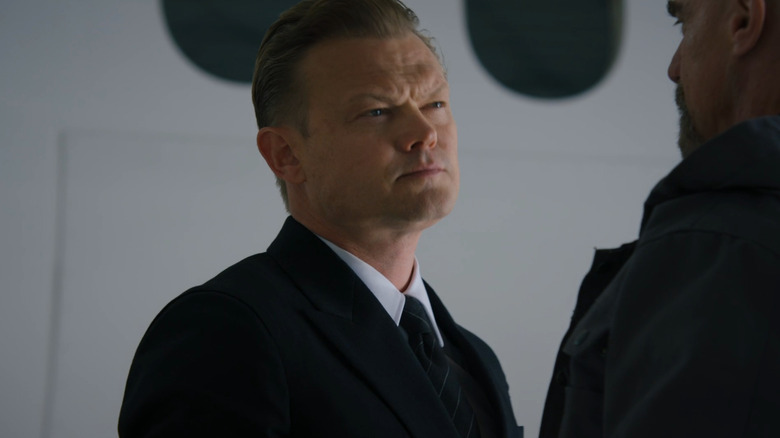 Tobias Krychek (Nikolai Nikolaeff) stares down Stabler (Christopher Meloni) in Law & Order: Organized Crime