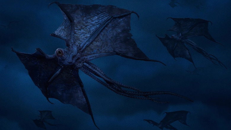 A Demo-Bat flying with a flock looks around with its eye in Stranger Things