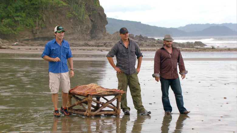 Jeff Boston, Rob, and Russell on a beach on Survivor Redemption Island