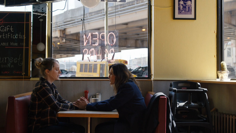 Kathleen and Olivia Benson speak in a cafe in "Law & Order: Organized Crime" (2021)