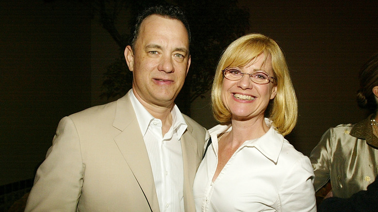 Tom Hanks and Bonnie Hunt standing next to each other