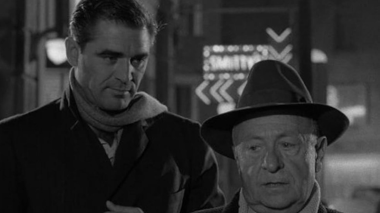 Fred Renard (Steve Cochran) stares at Pedott (Ernest Truex) in The Twilight Zone