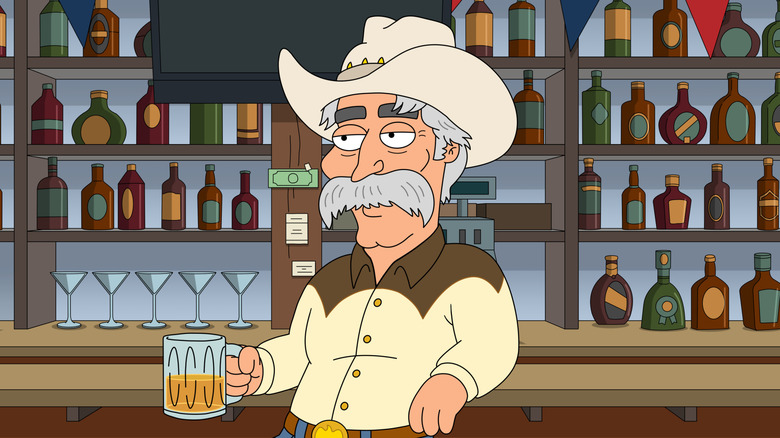 Wild West (Sam Elliott) sitting at the bar with a beer in Family Guy's Season 22 episode "A Stache from the Past"
