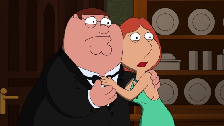 Peter and Lois Griffin embracing with fearful expressions on Family Guy S9E1