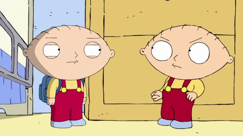 Season 10 Stewie Griffin and Season 1 Stewie Griffin glaring at each other on Family Guy S10E5