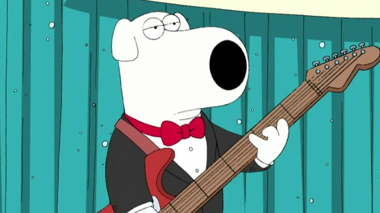 Brian Griffin playing an electric guitar on a prom stage on Family Guy S5E18