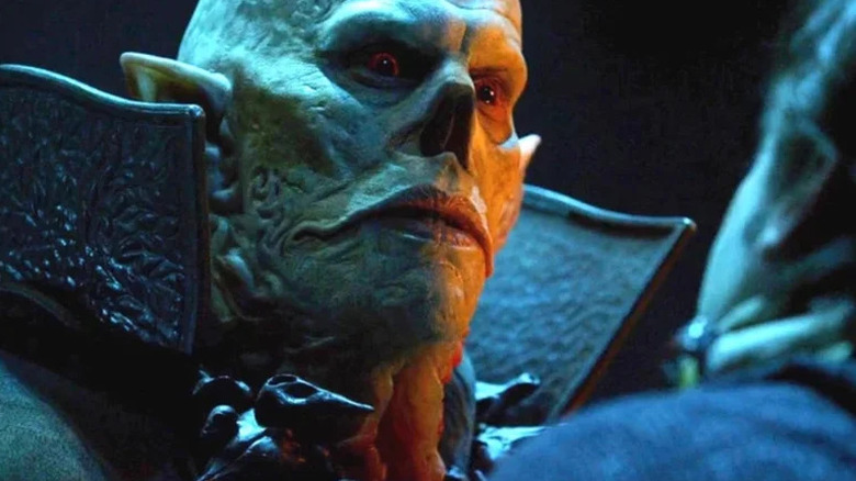 The Master (Jonathan Hyde) looking over a victim in The Strain