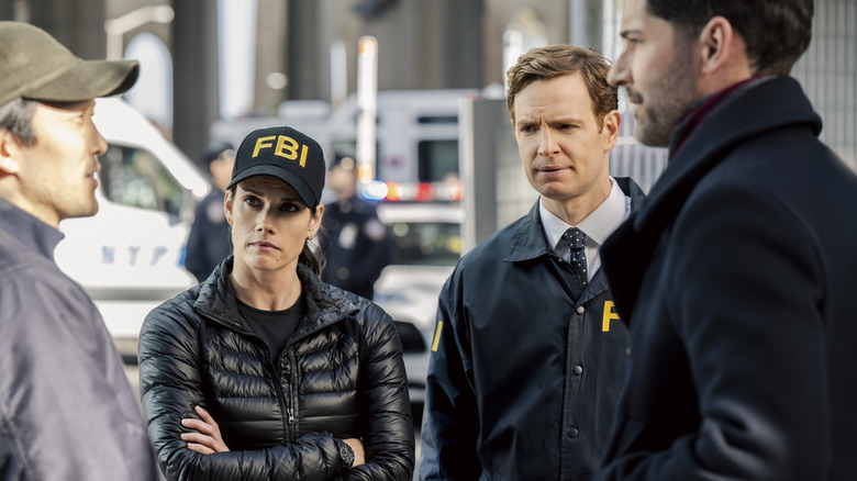 FBI's Missy Peregrym and CIA's Nick Gehlfuss and Tom Ellis