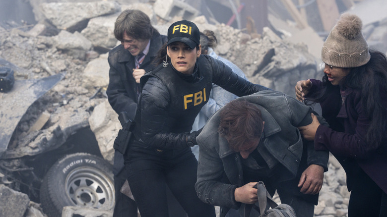 FBI's Maggie helps people out of the rubble in the Season 8 fall finale