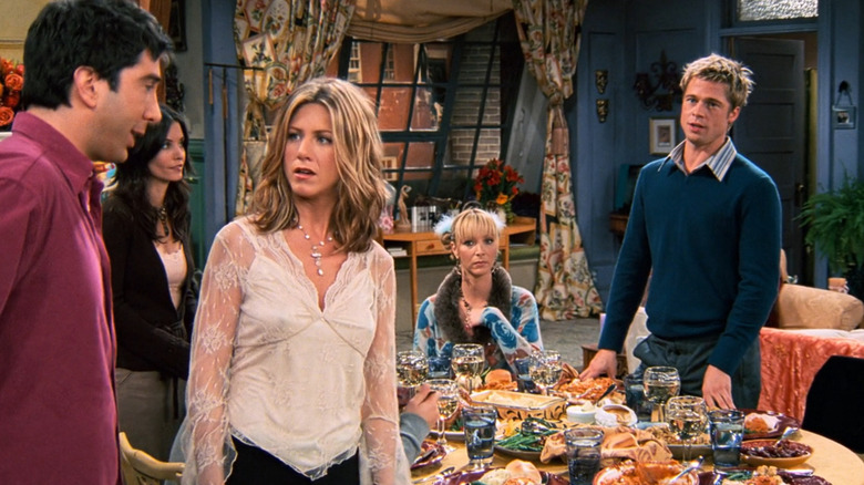 Rachel and Will stare at Ross
