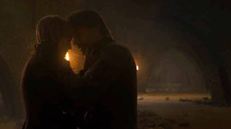 Cersei and Jaime embracing and touching foreheads in the cellar on Game of Thrones S8E5