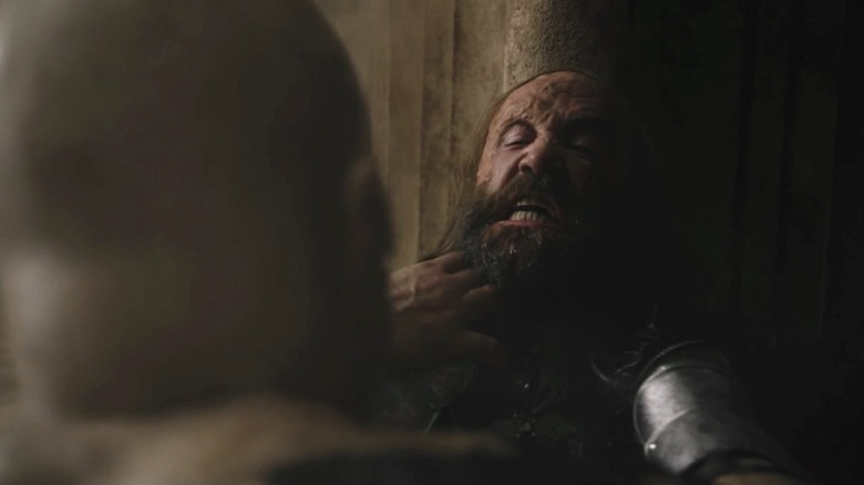 Sandor being pinned to a wall by Gregor on Game of Thrones S8E5