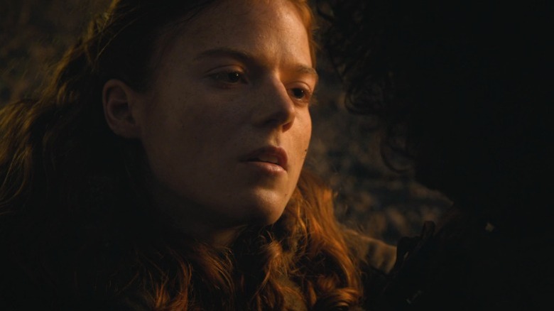 Ygritte lying in Jon's arms and gazing into his eyes on Game of Thrones S4E9