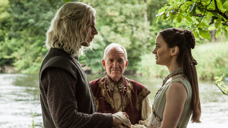 Wilf Scolding and Aisling Franciosi as Rhaegar and Lyanna marrying by a brook on Game of Thrones