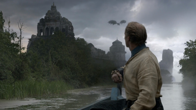 Iain Glen as Jorah looking at Drogon flying over Old Valyria on Game of Thrones