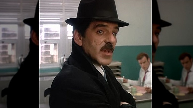 Lt. Mike Torello standing in a diner