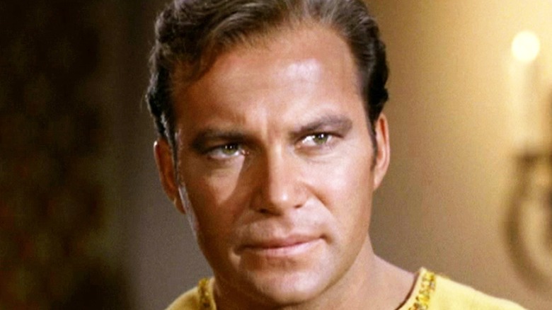 An intense close-up of William Shatner as Captain Kirk on the original Star Trek series.