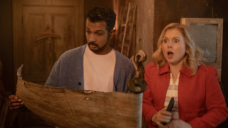 Ghosts' Utkarsh Ambudkar and Rose McIver in Halloween 5: The Mummy