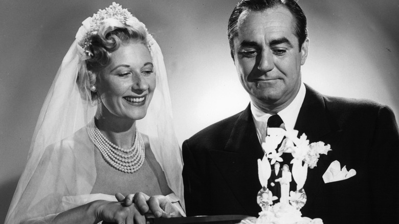 Joan Davis and Jim Backus pose in wedding outfits for a promotional photo for "I Married Joan" (1952)